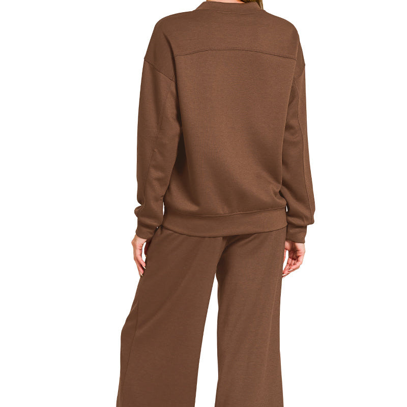 Brown outfit worn by a person on a white background