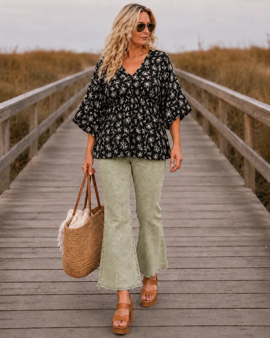 Midnight Meadow Floral Peplum Top