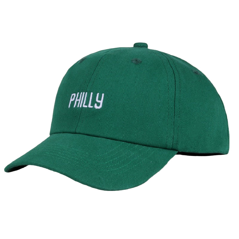 Green cap with 'PHILLY' text on a beige background