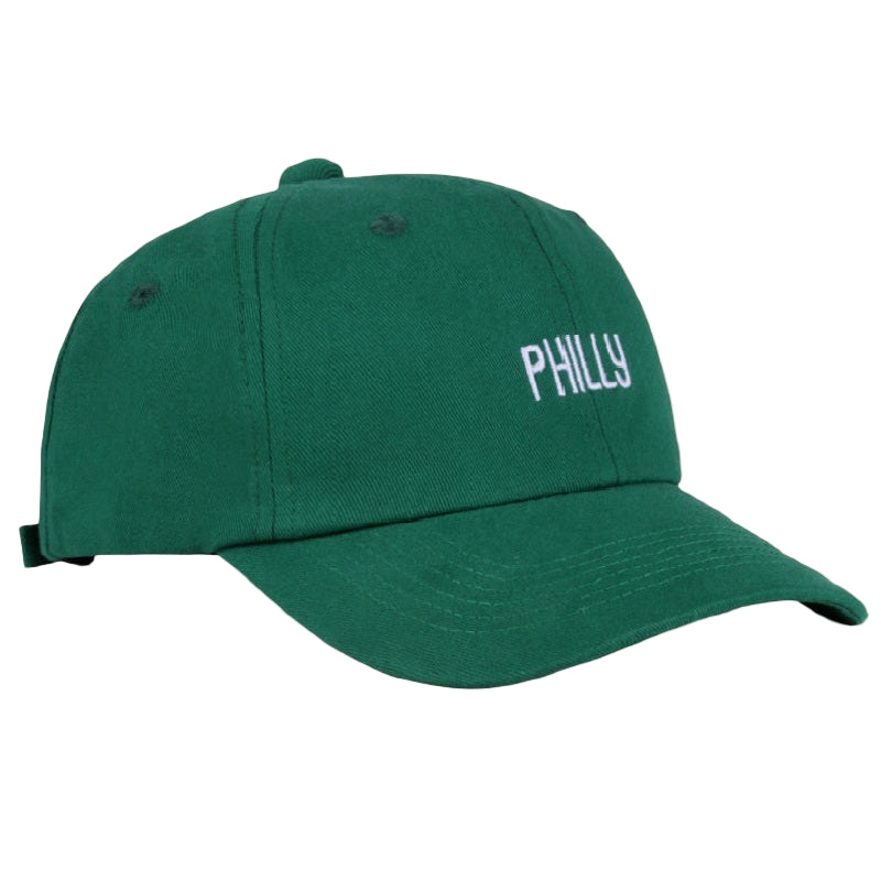 Green cap with 'PHILLY' text on a beige background